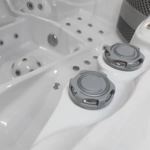 Buttons for adjusting the power of the massage nozzles in the Alpha 823 massage pool.