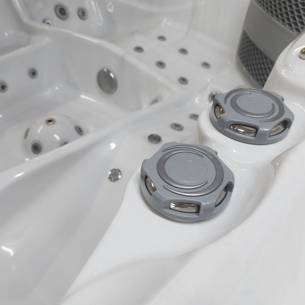 Buttons for adjusting the power of the massage nozzles in the Alpha 823 massage pool.